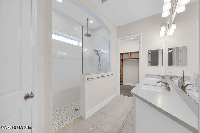 61 Spindrift Court St. Augustine, FL 32092 - Photo 15 of 61 a bathroom with a double vanity sink mirror and shower