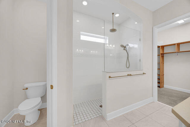 61 Spindrift Court St. Augustine, FL 32092 - Photo 21 of 61 a bathroom with a glass shower door and a toilet