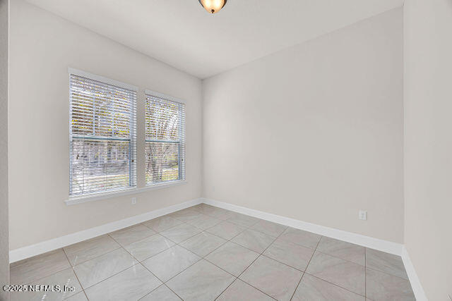 61 Spindrift Court St. Augustine, FL 32092 - Photo 27 of 61 a view of an empty room with a window