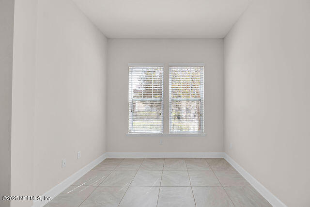 61 Spindrift Court St. Augustine, FL 32092 - Photo 29 of 61 an empty room with a window