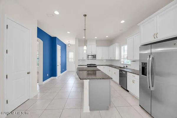 a view of a livingroom with a furniture