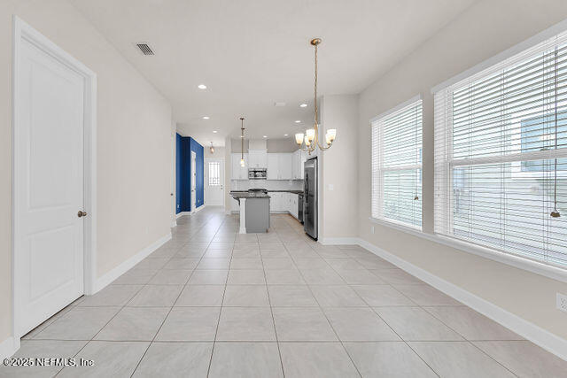 61 Spindrift Court St. Augustine, FL 32092 - Photo 37 of 61 a view of a kitchen with an empty space and a window