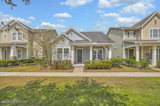 61 Spindrift Court St. Augustine, FL 32092 - Photo 44 of 61 a front view of a house with yard and green space