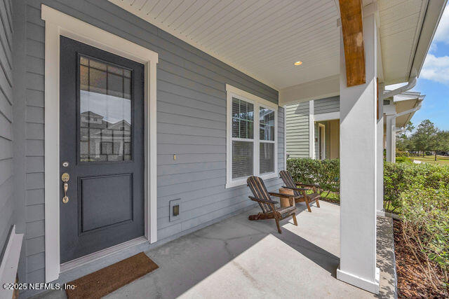 61 Spindrift Court St. Augustine, FL 32092 - Photo 46 of 61 a living room with furniture and windows