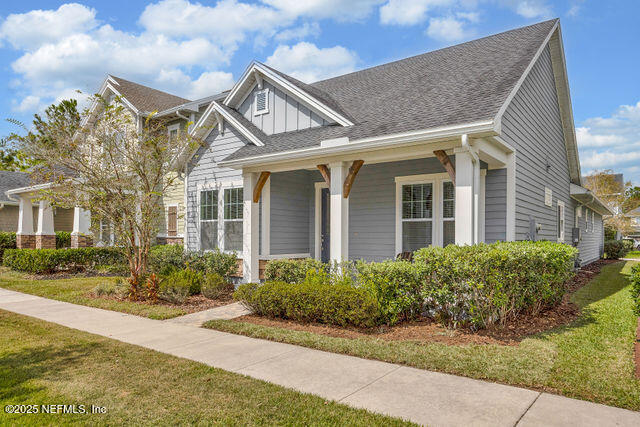61 Spindrift Court St. Augustine, FL 32092 - Photo 47 of 61 a front view of a house with garden