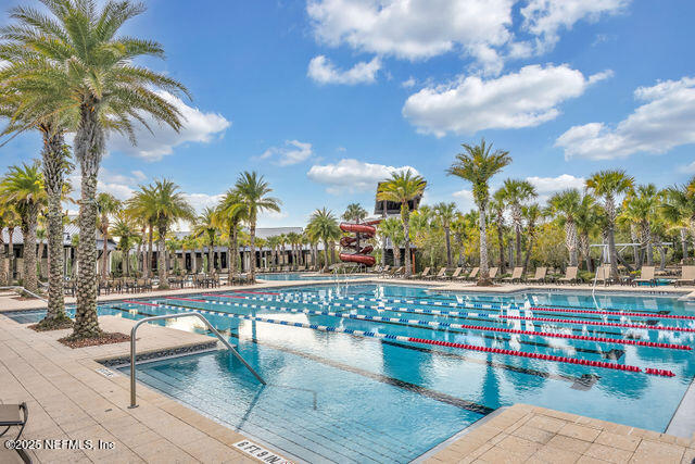 61 Spindrift Court St. Augustine, FL 32092 - Photo 8 of 61 a view of swimming pool with outdoor seating and city view