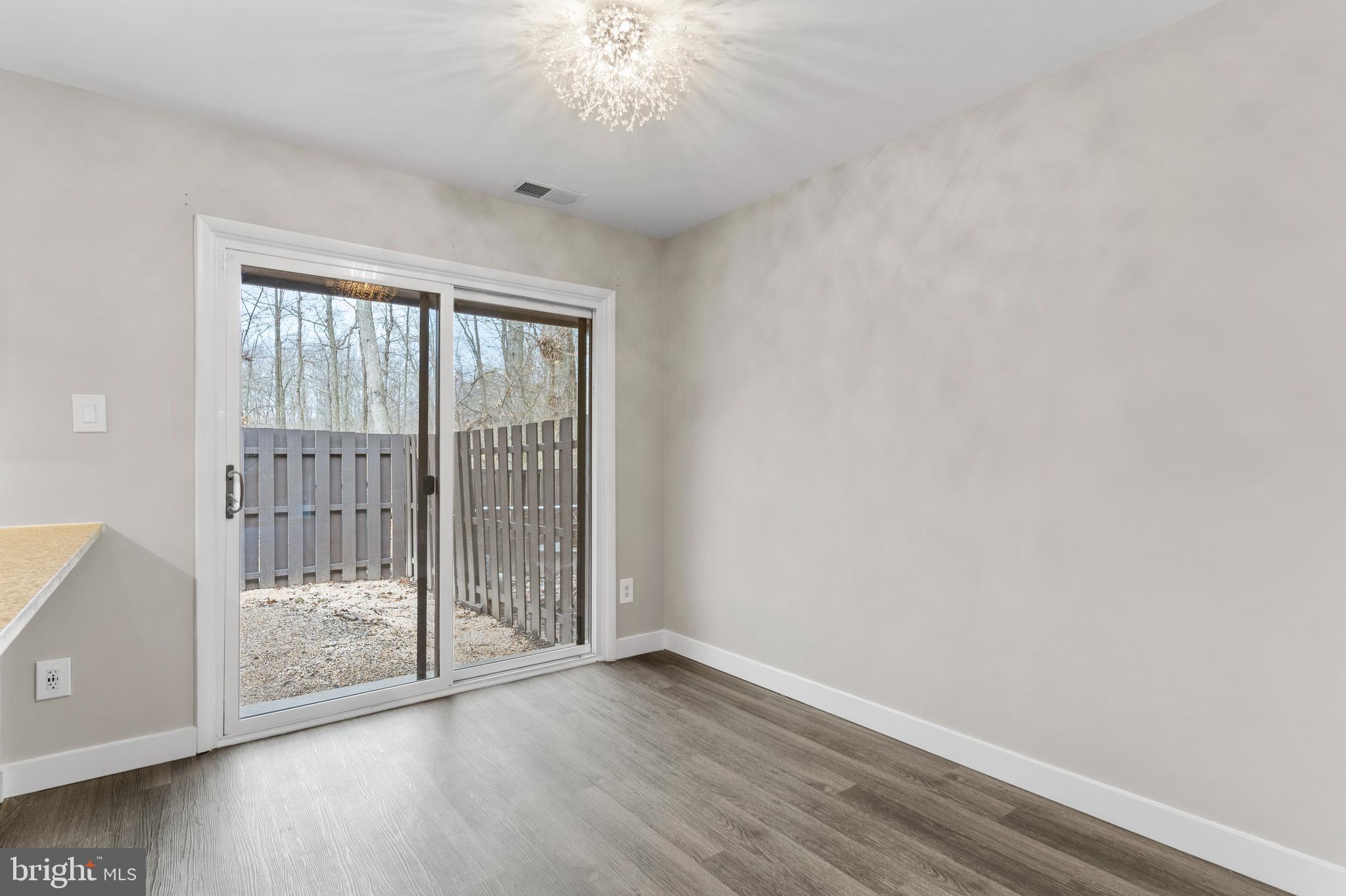 2138 Cartwright Place Reston, VA 20191 - Photo 11 of 27 Dining area with sliders to outdoor space