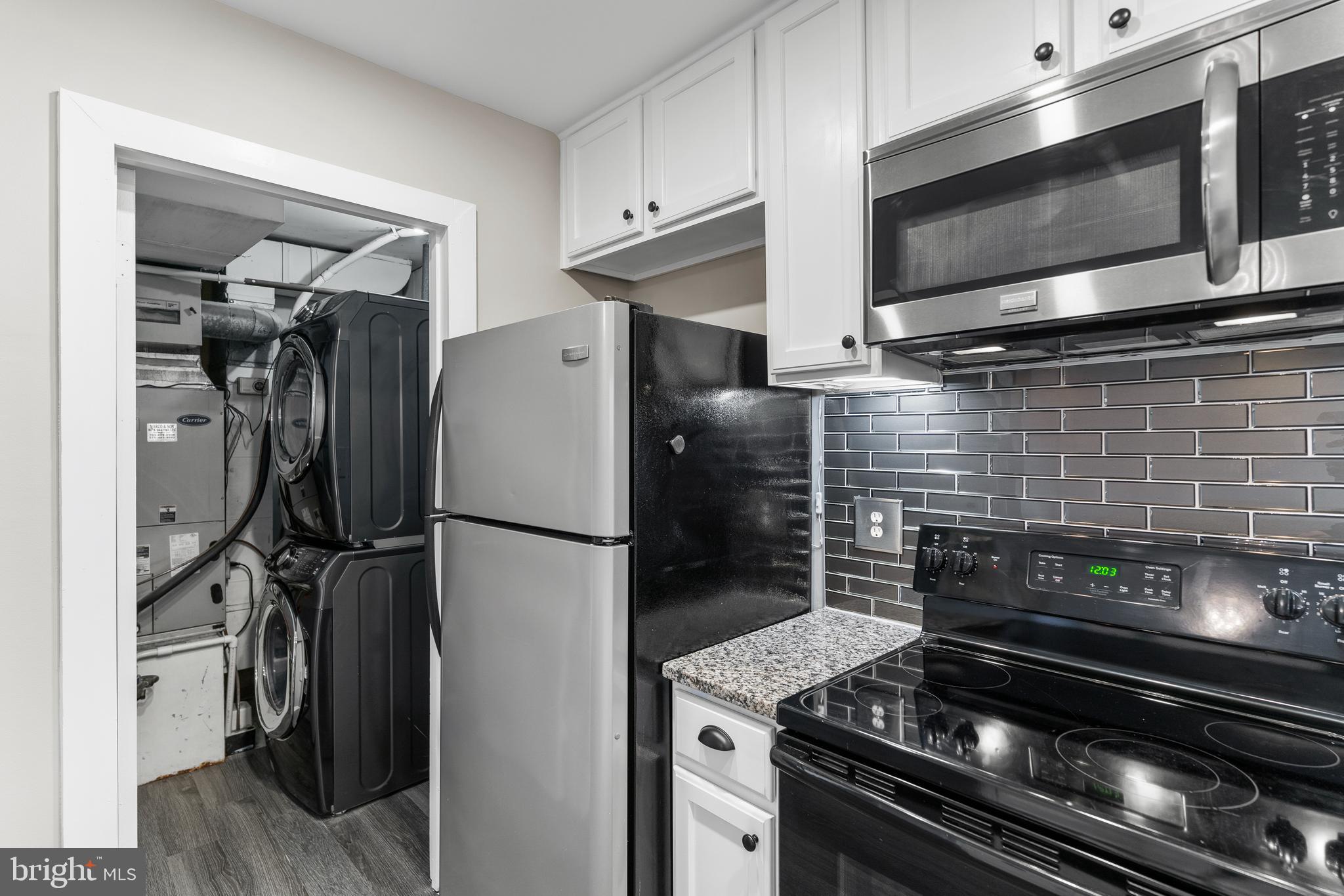 2138 Cartwright Place Reston, VA 20191 - Photo 12 of 27 Storage and laundry area