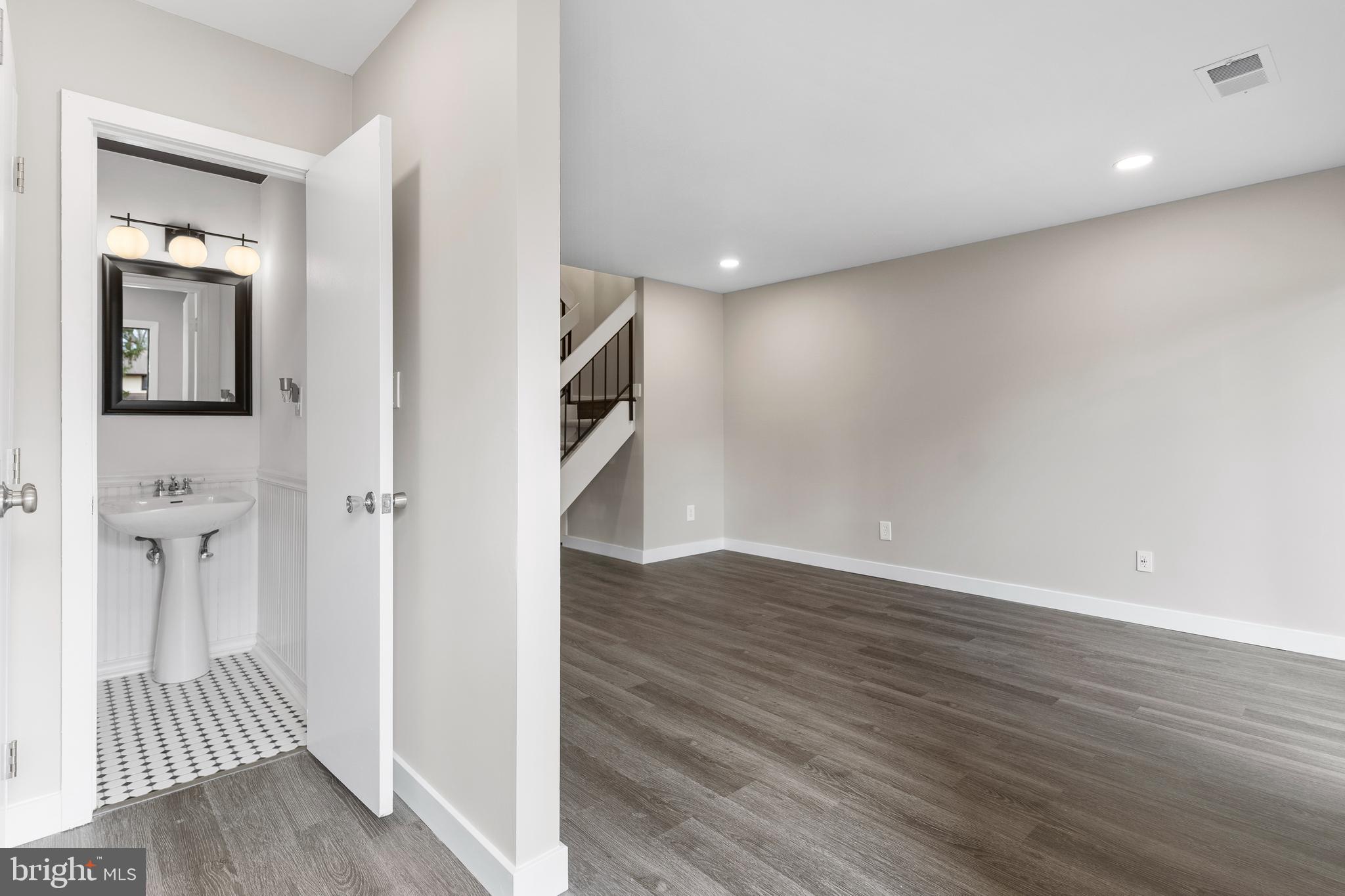 2138 Cartwright Place Reston, VA 20191 - Photo 6 of 27 Half bath off of entrance area