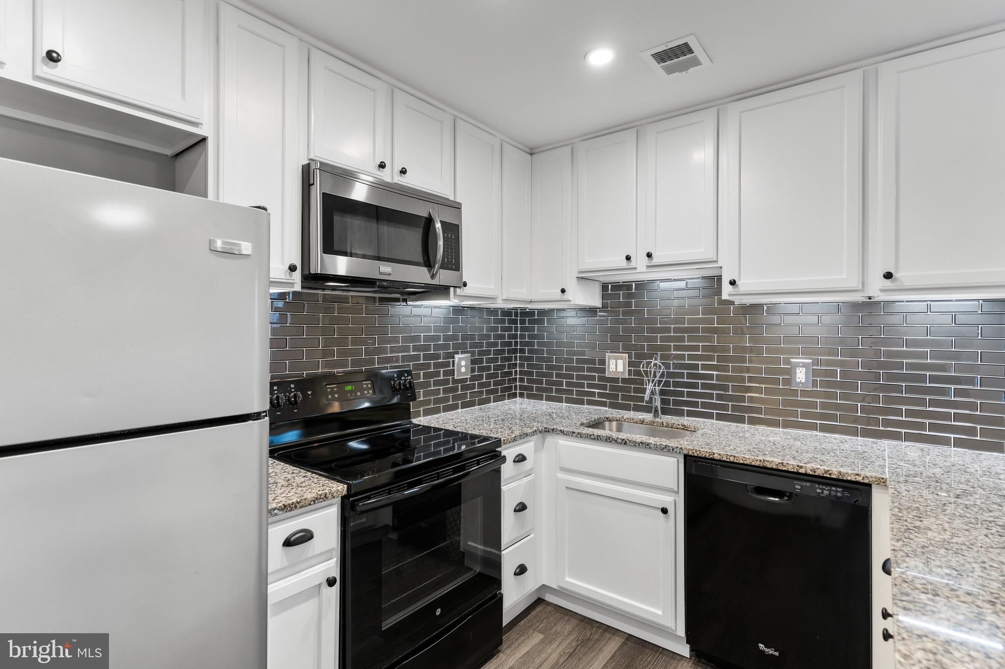 2138 Cartwright Place Reston, VA 20191 - Photo 7 of 27 Amazing kitchen with so many bells and whistles!