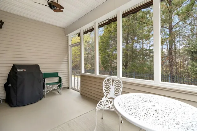 a view of a sitting area with furniture and garden view