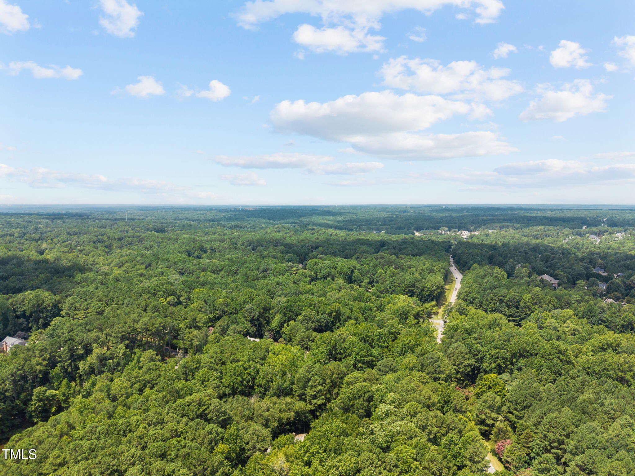 11705 Durant Road Raleigh, NC 27615 - Photo 3 of 51 7-web-or-mls-DJI_20250717120312_0817_D
