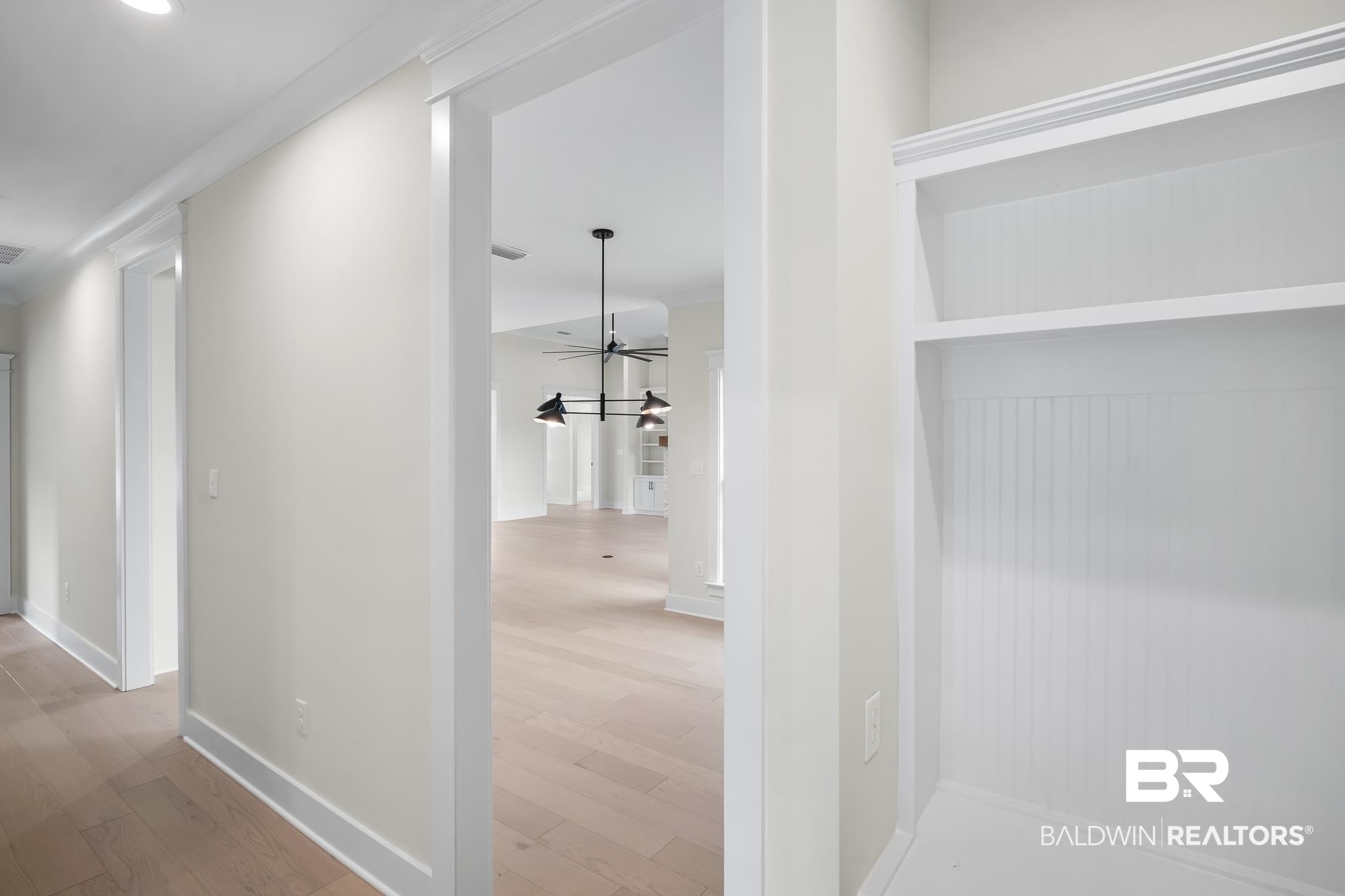 21826 Veranda Boulevard Fairhope, AL 36532 - Photo 31 of 42 Hallway with light wood finished floors and baseboards