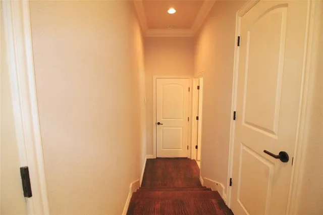 a large kitchen with kitchen island a large counter top space a sink stainless steel appliances and cabinets