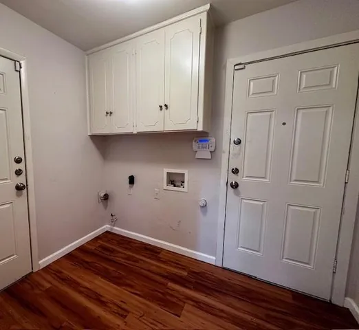 a view of kitchen with wooden floor