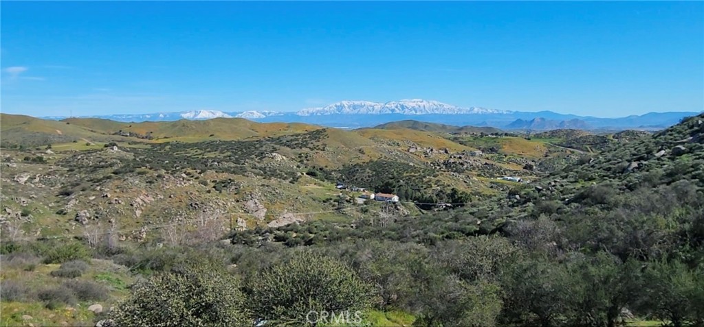 23250 El Nido Road Perris, CA 92570 - Photo 16 of 23 a view of a mountain range with lush green forest