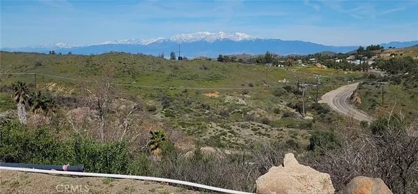 a view of a mountain with a outdoor space