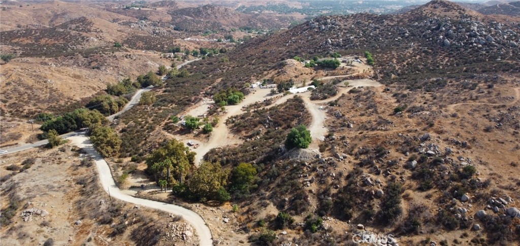 23250 El Nido Road Perris, CA 92570 - Photo 4 of 23 a view of a house with a yard