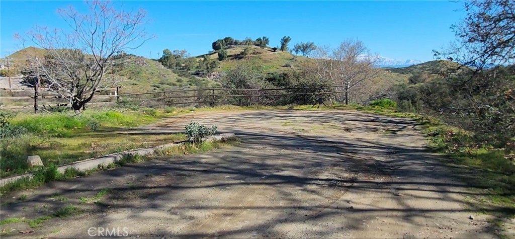 23250 El Nido Road Perris, CA 92570 - Photo 6 of 23 a view of a yard with a mountain