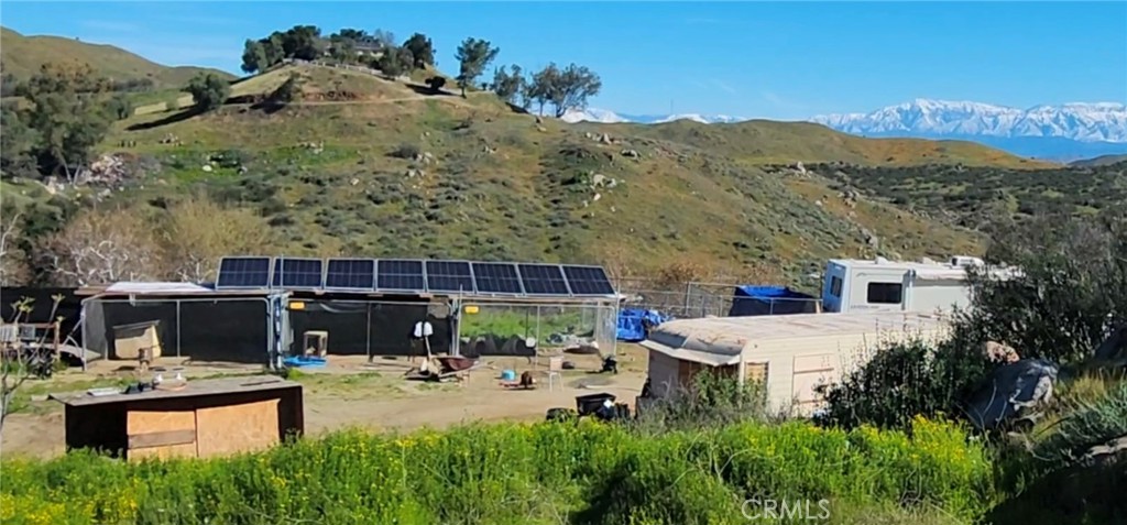 23250 El Nido Road Perris, CA 92570 - Photo 9 of 23 a view of a house with a patio