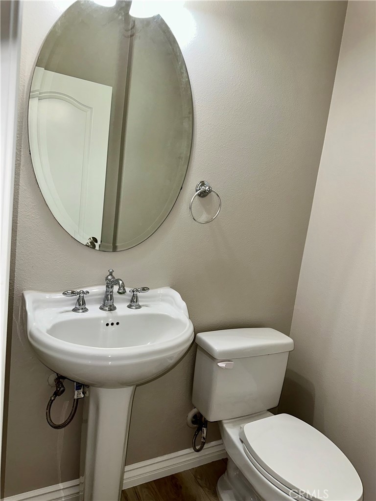 21 Durlston Way Ladera Ranch, CA 92694 - Photo 38 of 47 a bathroom with a sink toilet and a mirror
