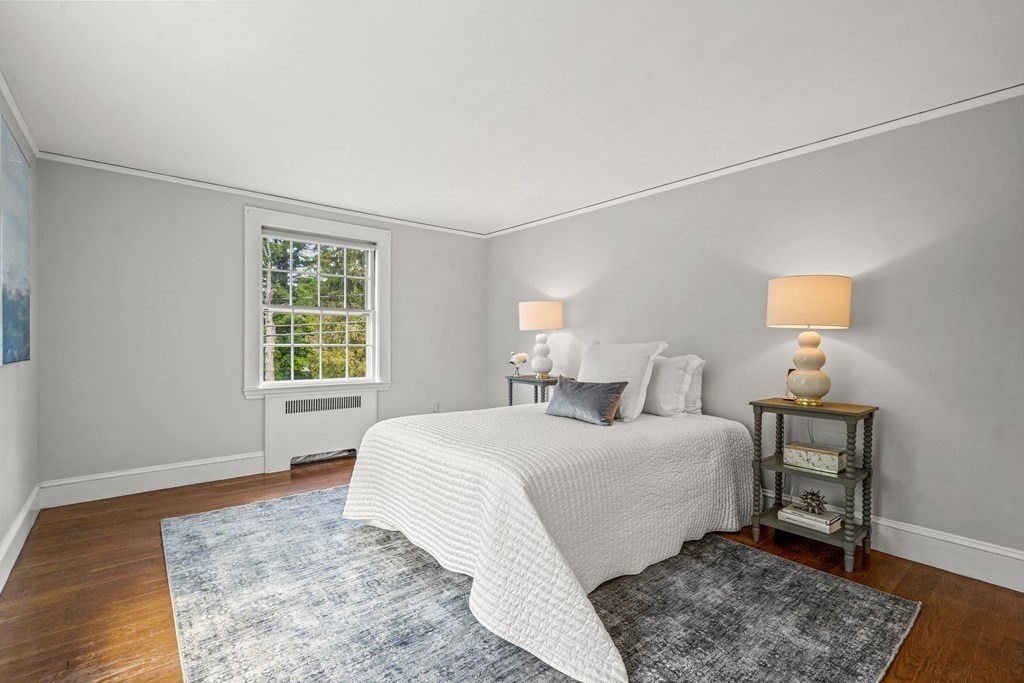 36 Laurel Avenue Wellesley, MA 02481 - Photo 14 of 27 a bedroom with a bed and a window