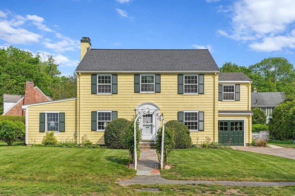 36 Laurel Avenue Wellesley, MA 02481 - Photo 24 of 27 a front view of a house with a garden