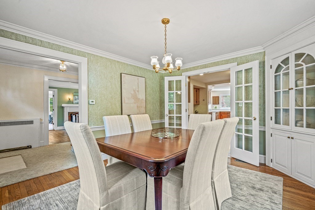 36 Laurel Avenue Wellesley, MA 02481 - Photo 7 of 27 a view of a dining room with furniture and wooden floor