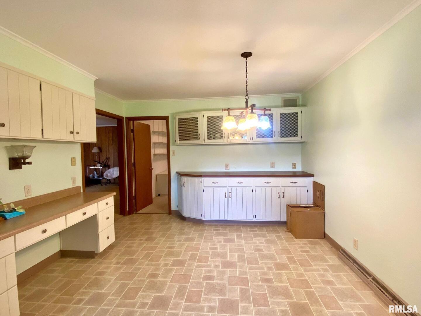 807 West Market Street Christopher, IL 62822 - Photo 13 of 57 a kitchen with a cabinets and window