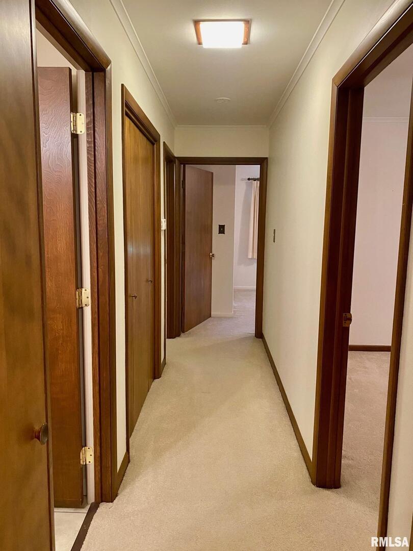 807 West Market Street Christopher, IL 62822 - Photo 29 of 57 a view of a hallway with painted walls