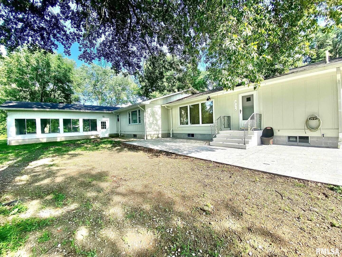 807 West Market Street Christopher, IL 62822 - Photo 38 of 57 a view of a house with a backyard