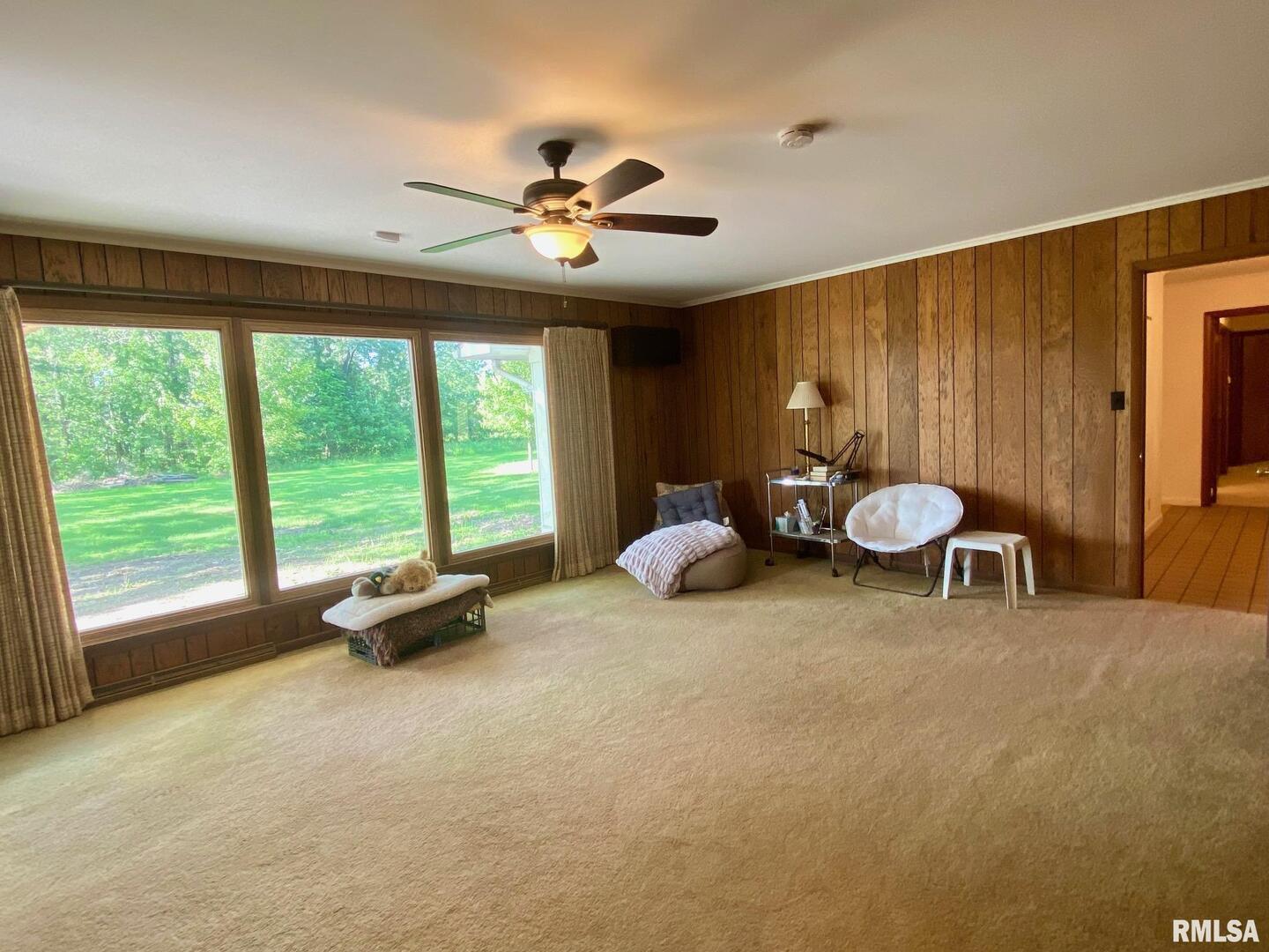 807 West Market Street Christopher, IL 62822 - Photo 5 of 57 a living room with furniture and a large window