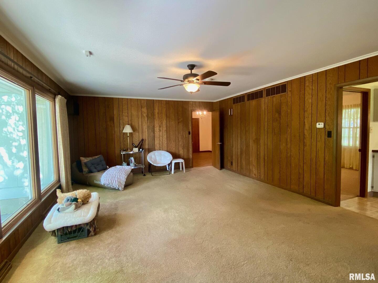 807 West Market Street Christopher, IL 62822 - Photo 6 of 57 a view of a livingroom with furniture and a large window