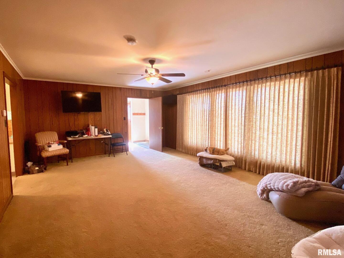 807 West Market Street Christopher, IL 62822 - Photo 7 of 57 a view of a room with furniture and a large window