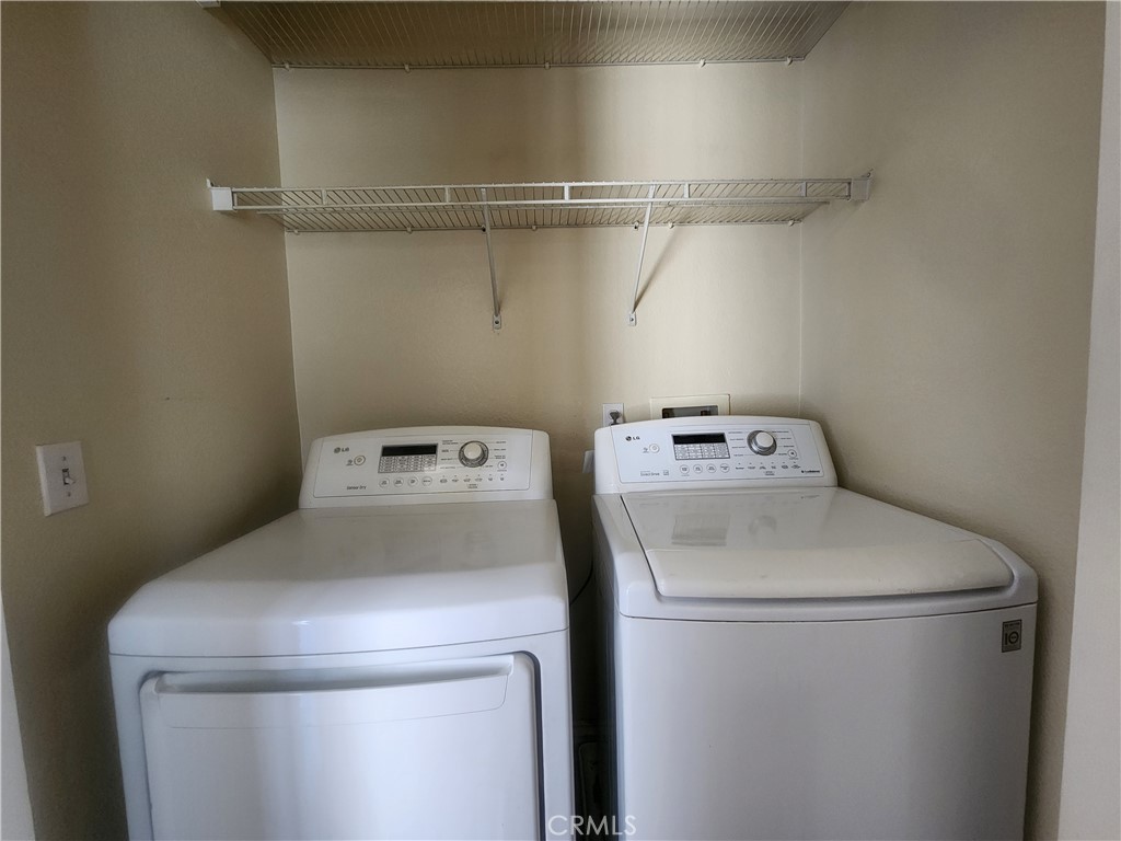 7331 Shelby Place, Unit U43 Rancho Cucamonga, CA 91739 - Photo 11 of 26 a utility room with dryer and washer