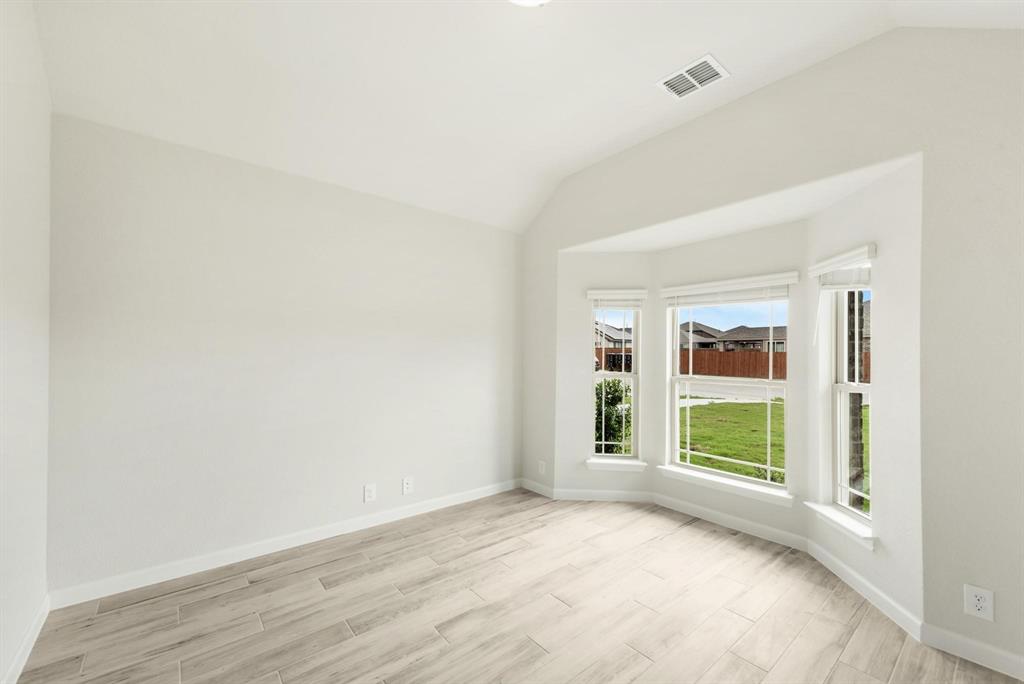 920 Elk Ridge Run Godley, TX 76044 - Photo 30 of 34 Expansive bay window offering natural illumination