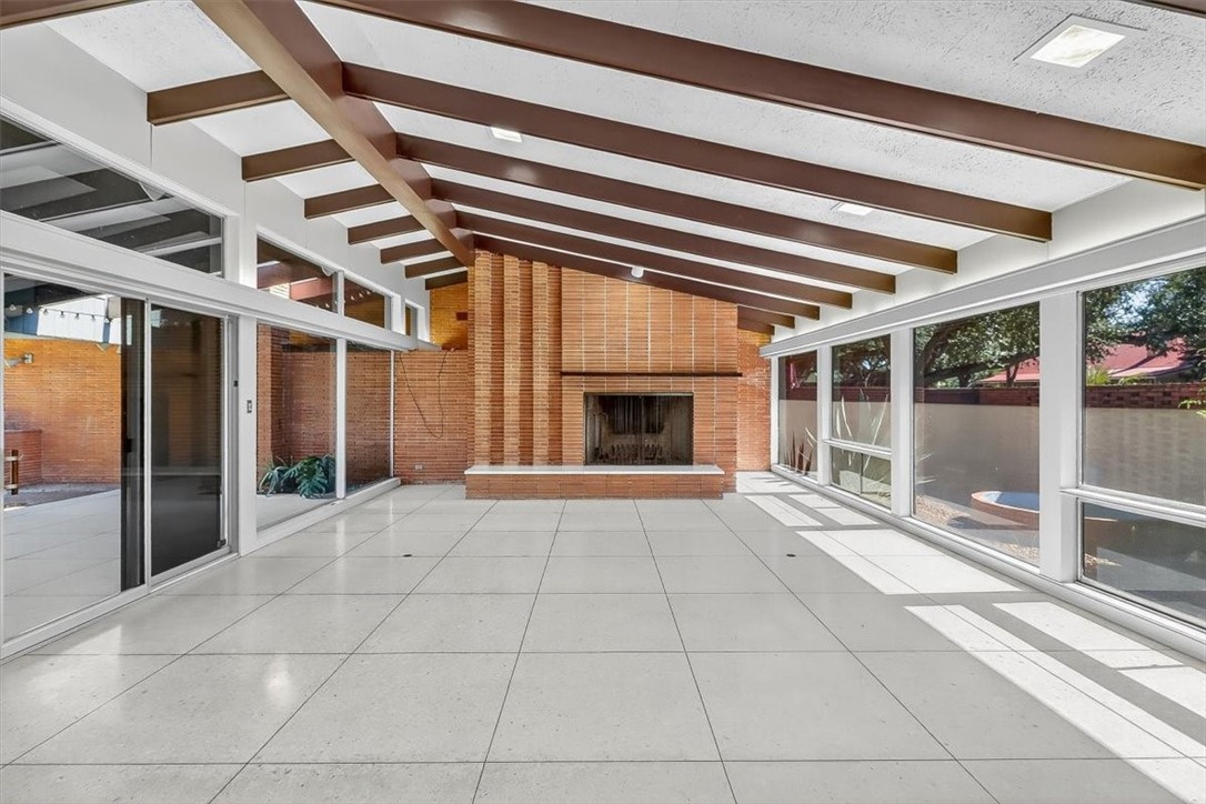 1813 Clare Drive Alice, TX 78332 - Photo 4 of 30 a view of an empty room with a fireplace and window