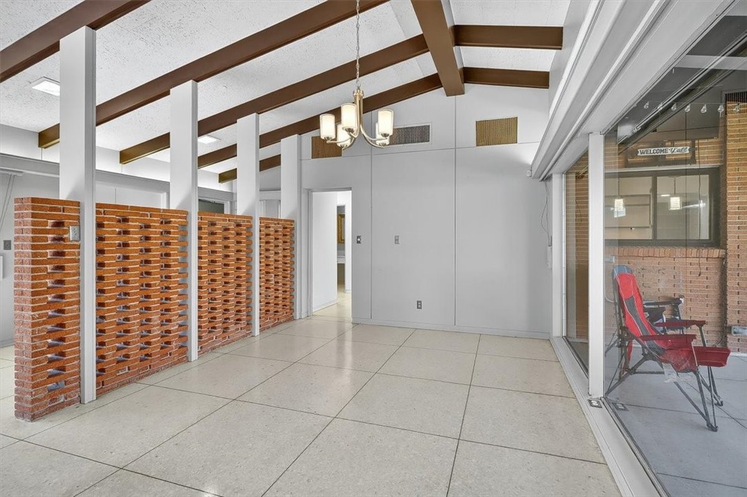 1813 Clare Drive Alice, TX 78332 - Photo 6 of 30 a view of a brick house with an outdoor space