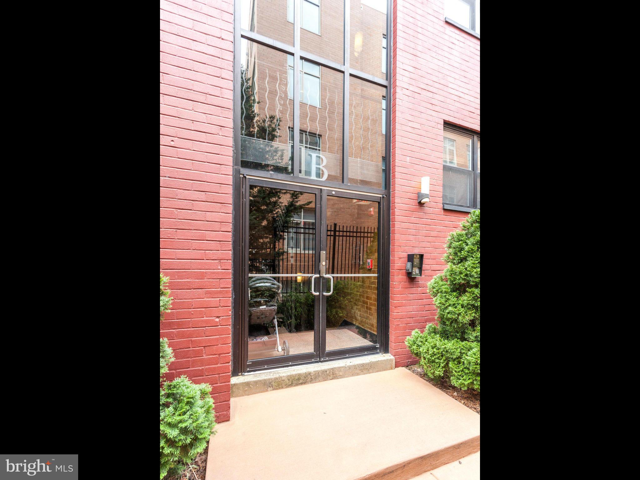 1354 Euclid Street Northwest, Unit B402 Washington, DC 20009 - Photo 2 of 30 a view of a door and a window