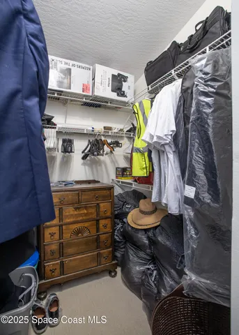 a view of a workspace with bookshelf