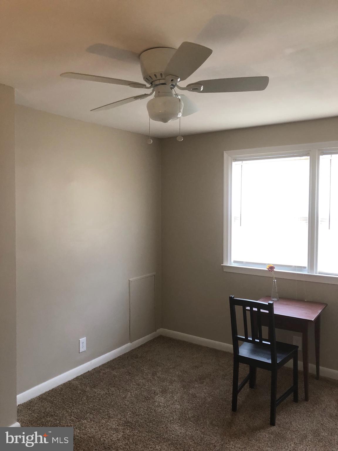 2233 Graythorn Road Middle River, MD 21220 - Photo 28 of 36 an empty room with a window and a table