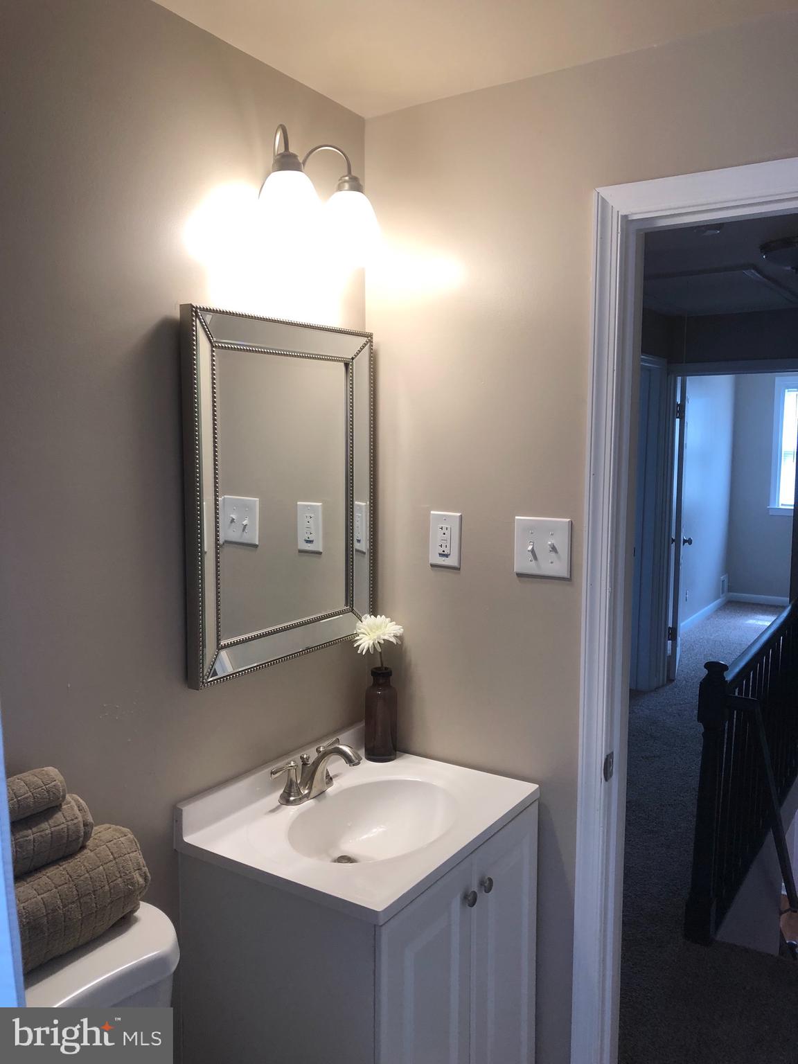 2233 Graythorn Road Middle River, MD 21220 - Photo 34 of 36 a bathroom with a sink vanity and mirror