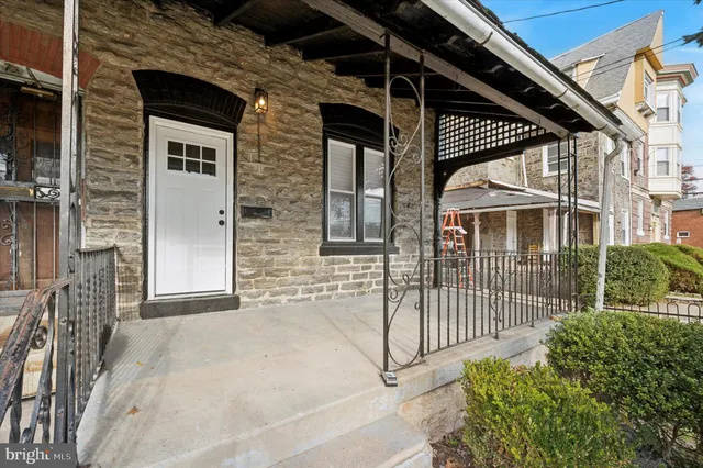 a view of a house with a porch