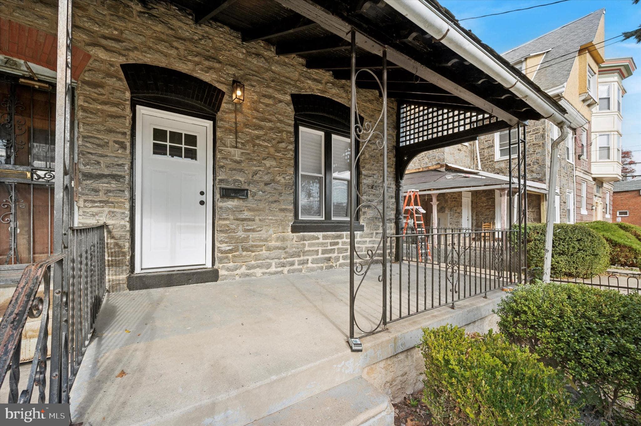 75 High Street Philadelphia, PA 19144 - Photo 18 of 20 a view of a house with a porch