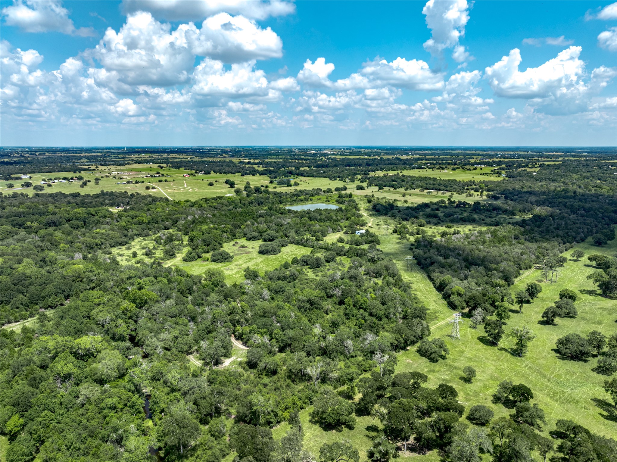 4900 Andreas Road Round Top, TX 78954 - Photo 10 of 20 a view of an outdoor space with a lake view