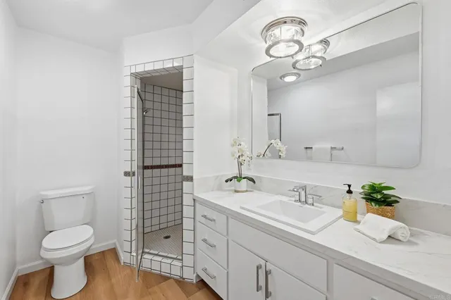 a view of balcony with wooden floor