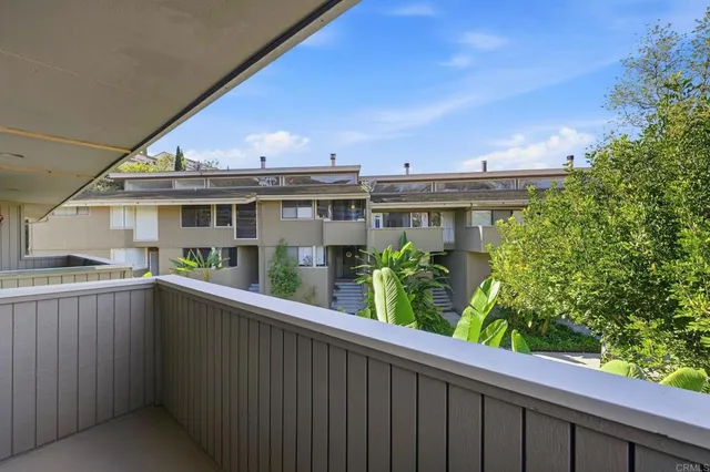 aerial view of a house with a yard