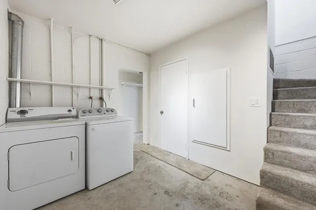 a view of a chairs and table in the patio