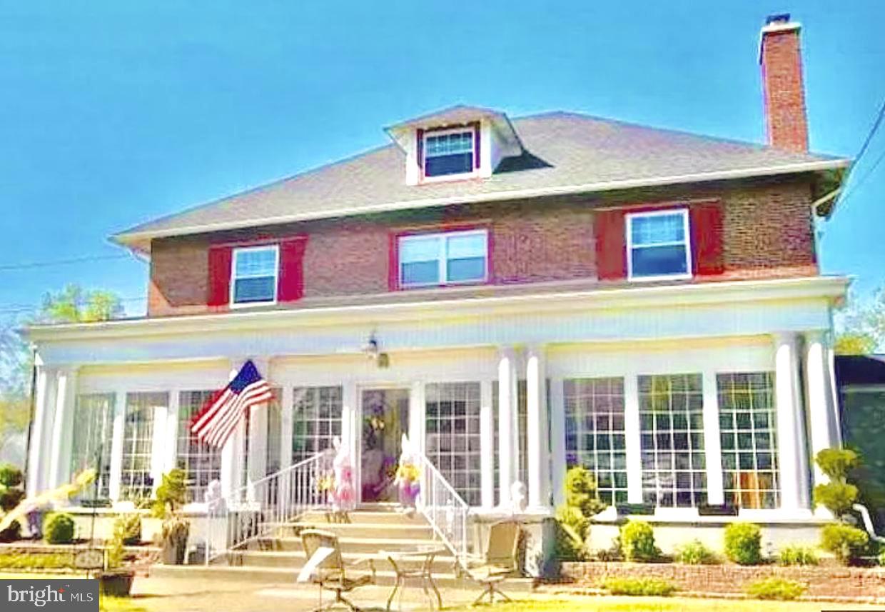 420 Heulings Avenue, Unit 2S Riverside, NJ 08075 - Photo 1 of 11 a view of a building with many windows