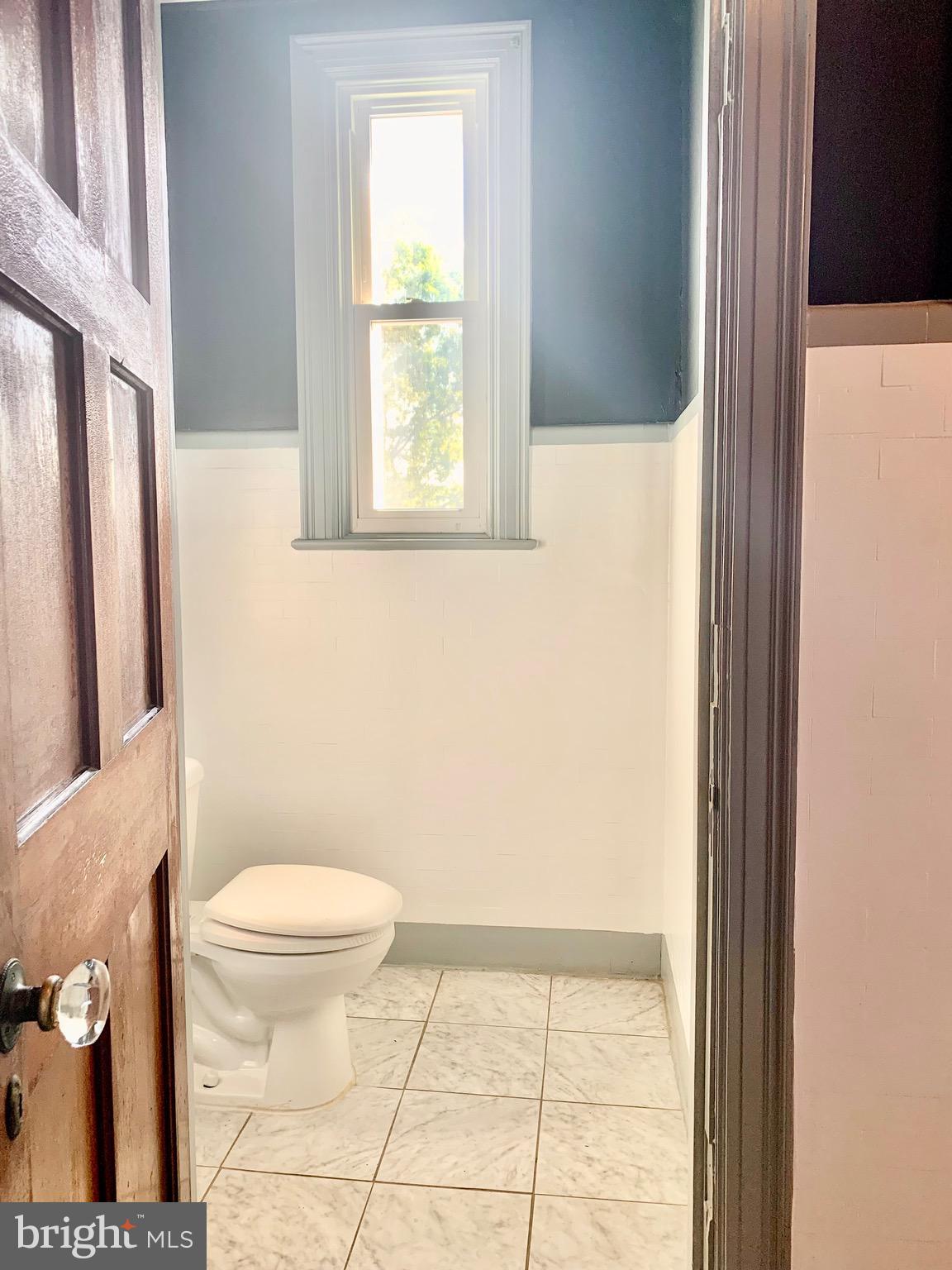 420 Heulings Avenue, Unit 2S Riverside, NJ 08075 - Photo 10 of 11 a bathroom with a toilet